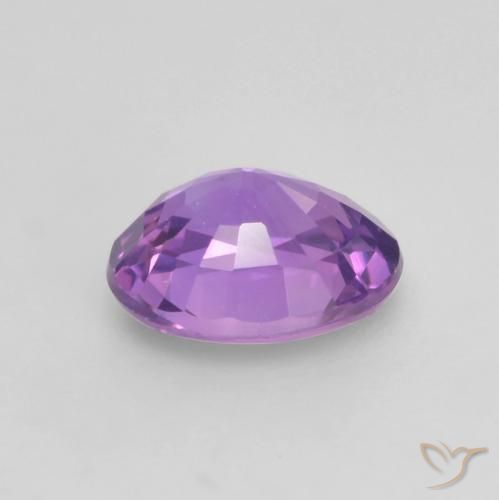 Saphir Violet rose vif naturelle ovale, 0.56 ct, VS