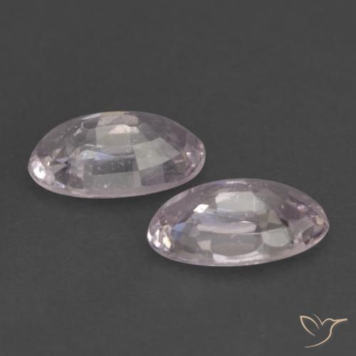 Shop natural 0.62ct Blanc rose violacé Saphir gems, ovale, from Tanzanie at GemSelect. In stock, global shipping!