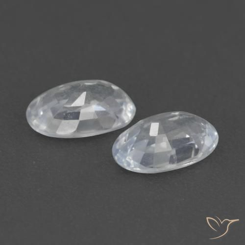 Shop natural 0.63ct Blanc bleuâtre Saphir gems, ovale, from Tanzanie at GemSelect. In stock, global shipping!