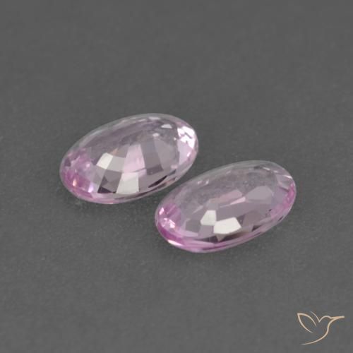 Shop natural 0.47ct Pourpre rosâtre léger Saphir gems, ovale, from Tanzanie at GemSelect. In stock, global shipping!