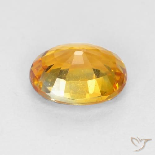 Saphir Or orange foncé naturelle ovale, 0.59 ct, VVS-VS