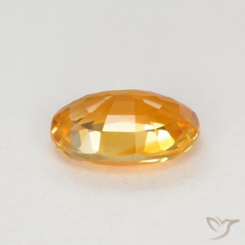 Saphir Or orange foncé naturelle ovale, 0.72 ct, VVS-VS
