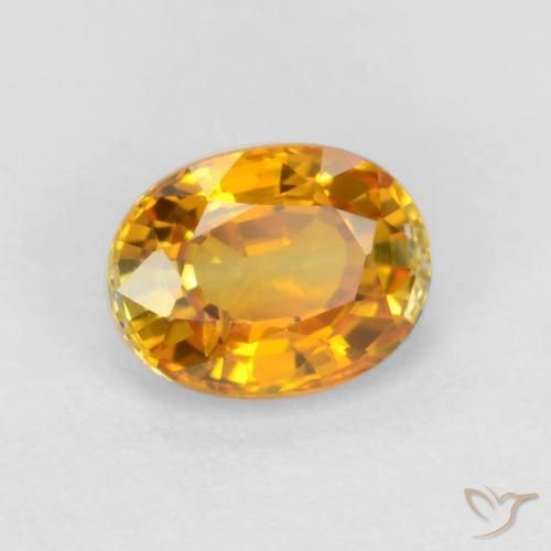 Saphir Doré-orange foncé naturelle ovale, 0.72 ct, VS