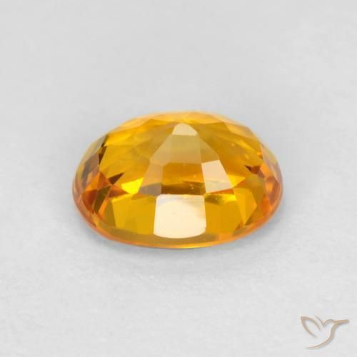 Saphir Doré-orange foncé naturelle ovale, 0.72 ct, VS