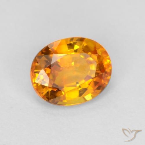 Saphir Doré-orange foncé naturelle ovale, 0.72 ct, VVS-VS