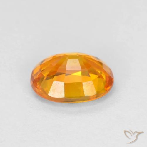 Saphir Doré-orange foncé naturelle ovale, 0.72 ct, VVS-VS