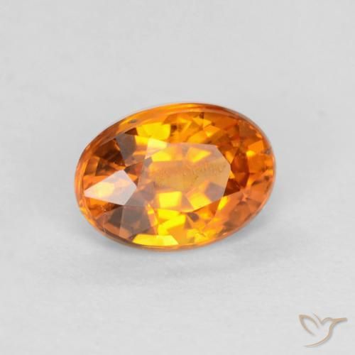 Saphir Abricot orange naturelle ovale, 0.59 ct, VS