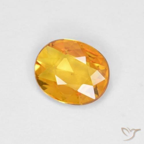 Saphir Doré-orange foncé naturelle ovale, 0.58 ct, VVS-VS