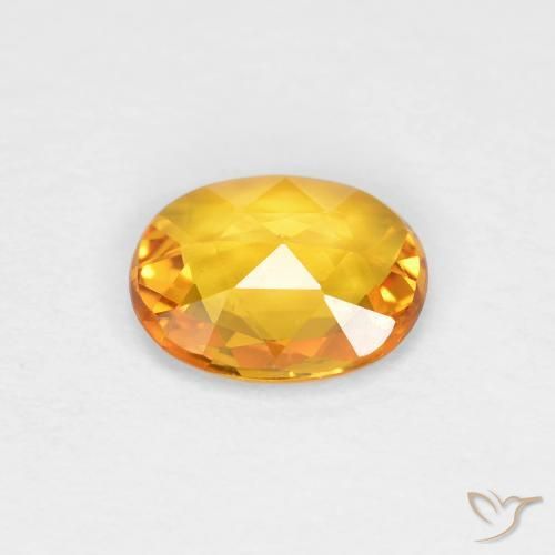 Saphir Doré-orange foncé naturelle ovale, 0.58 ct, VVS-VS