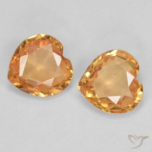 Shop natural 0.72ct Orange intense Saphir gems, Cœur, from Tanzanie at GemSelect. In stock, global shipping!