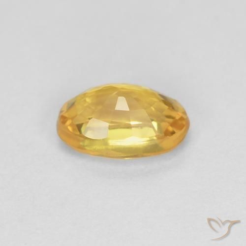 Saphir Orange doré profond naturelle ovale, 0.70 ct, VS