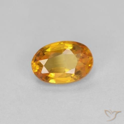 Saphir Or orange foncé naturelle ovale, 0.56 ct, VVS-VS