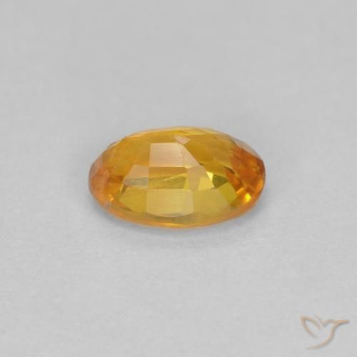 Saphir Or orange foncé naturelle ovale, 0.56 ct, VVS-VS