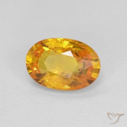 Saphir Or-orange moyen naturelle ovale, 0.70 ct, VS