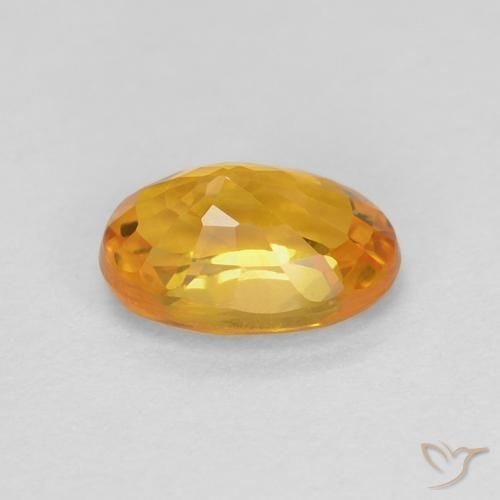 Saphir Or-orange moyen naturelle ovale, 0.70 ct, VS