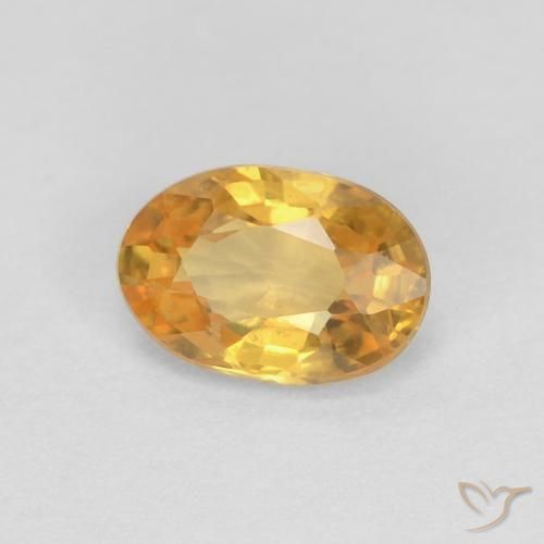 Saphir Orange doré profond naturelle ovale, 0.56 ct, VS
