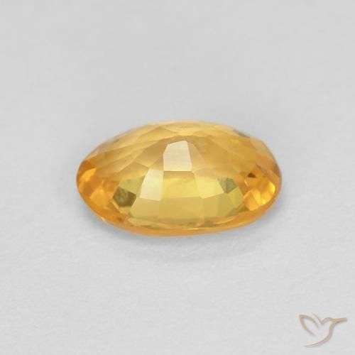 Saphir Orange doré profond naturelle ovale, 0.56 ct, VS