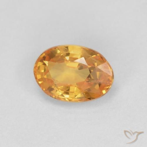 Saphir Doré-orange foncé naturelle ovale, 0.62 ct, VS