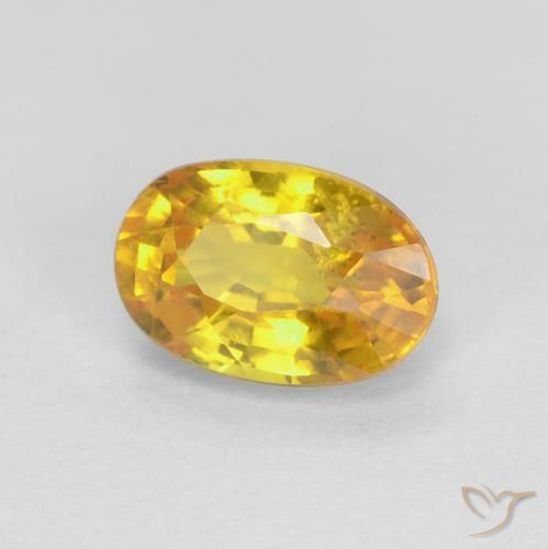 Saphir Orange Doré naturelle ovale, 0.75 ct, VS