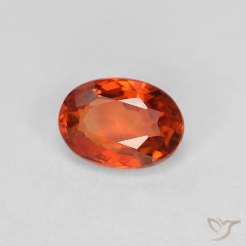 Saphir Orange rougeâtre naturelle ovale, 0.64 ct, VVS