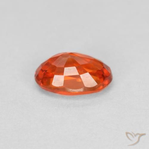 Saphir Orange rougeâtre naturelle ovale, 0.64 ct, VVS