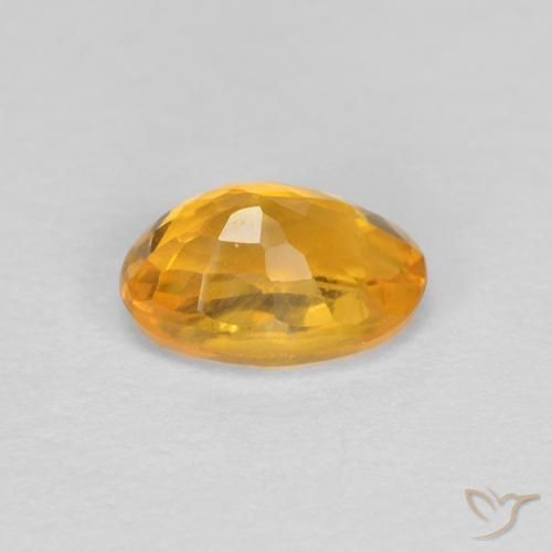 Saphir Orange-or naturelle ovale, 0.60 ct, VVS