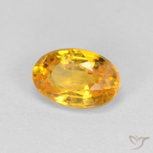 Saphir Orange Doré naturelle ovale, 0.66 ct, VVS