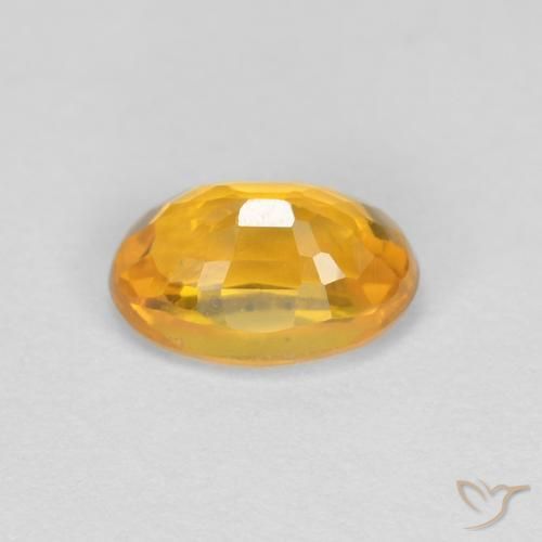 Saphir Orange Doré naturelle ovale, 0.66 ct, VVS
