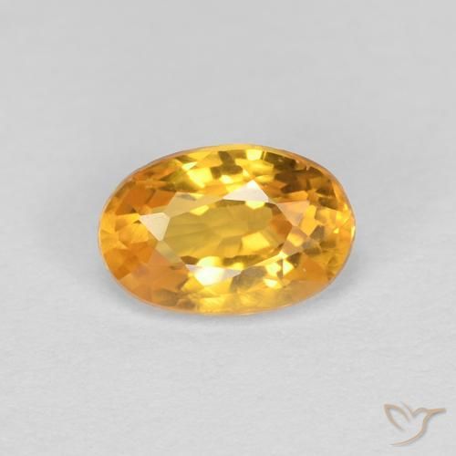 Saphir Orange doré profond naturelle ovale, 0.55 ct, VVS