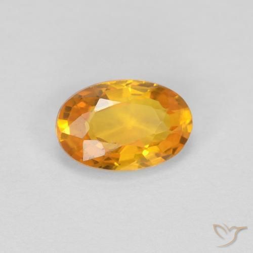 Saphir Doré-orange foncé naturelle ovale, 0.62 ct, VVS