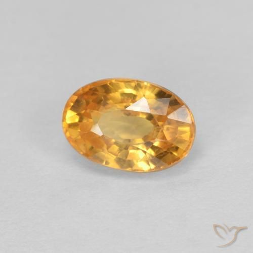 Saphir Or orange foncé naturelle ovale, 0.75 ct, VVS