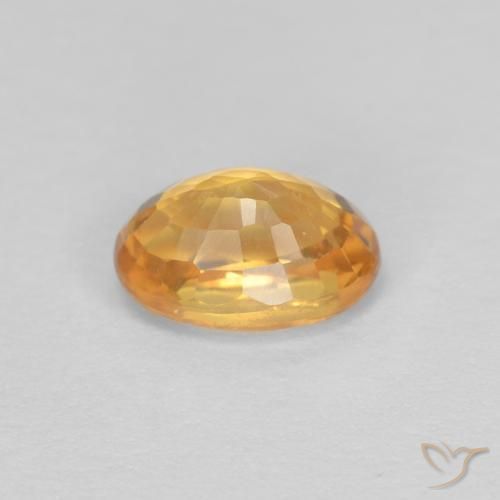 Saphir Or orange foncé naturelle ovale, 0.75 ct, VVS