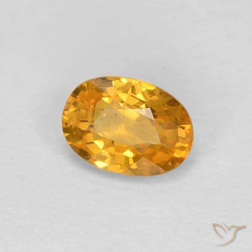 Saphir Orange moyen naturelle ovale, 0.60 ct, VS