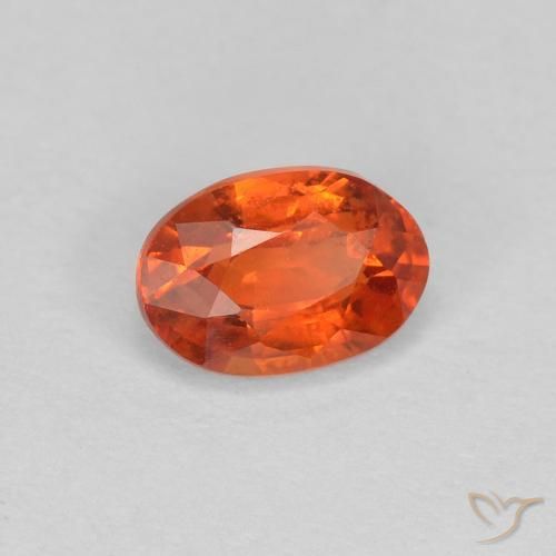 Saphir Orange rougeâtre naturelle ovale, 0.68 ct, VS