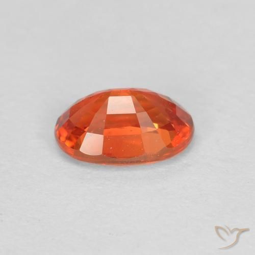 Saphir Orange rougeâtre naturelle ovale, 0.60 ct, VS