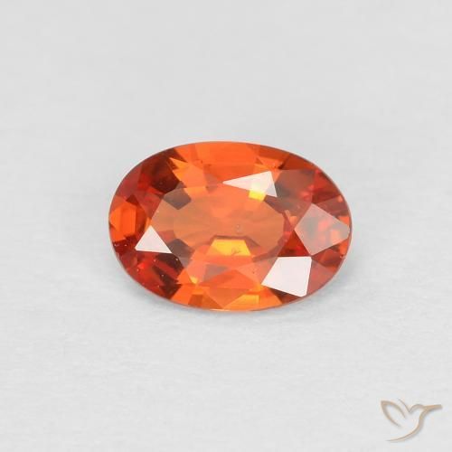 Saphir Orange rougeâtre naturelle ovale, 0.48 ct, VS