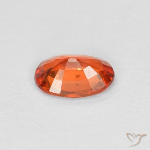 Saphir Orange rougeâtre naturelle ovale, 0.48 ct, VS