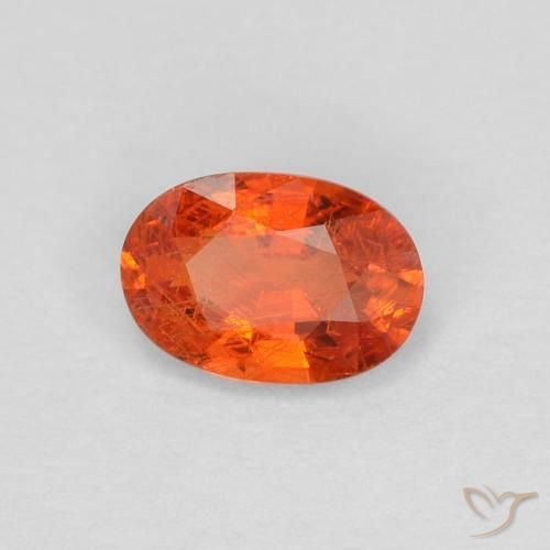 Saphir Orange rougeâtre naturelle ovale, 0.55 ct, VS