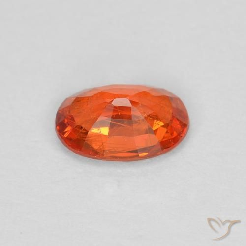 Saphir Orange rougeâtre naturelle ovale, 0.55 ct, VS