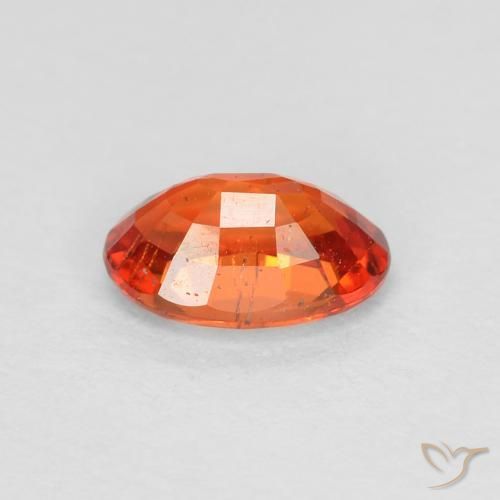 Saphir Orange rougeâtre naturelle ovale, 0.65 ct, VS