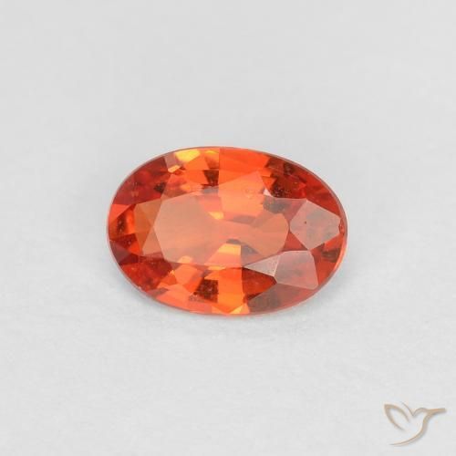 Saphir Orange rougeâtre naturelle ovale, 0.46 ct, VS