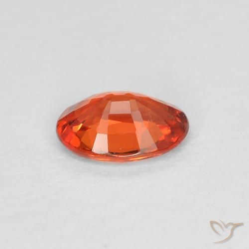 Saphir Orange rougeâtre naturelle ovale, 0.49 ct, VS