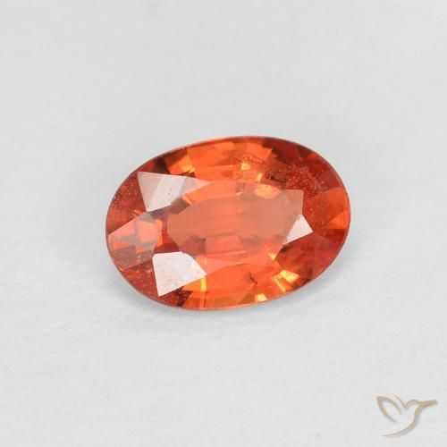 Saphir Orange rougeâtre naturelle ovale, 0.49 ct, VS