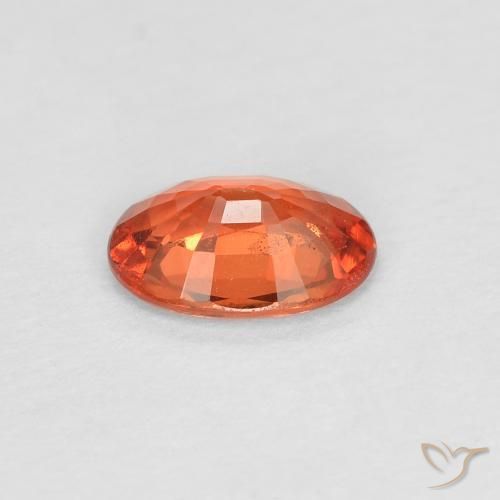 Saphir Orange rougeâtre naturelle ovale, 0.49 ct, VS