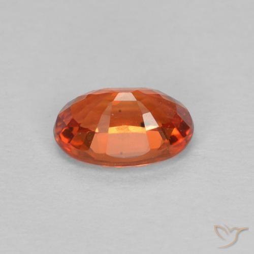 Saphir Orange rougeâtre naturelle ovale, 0.64 ct, VVS-VS