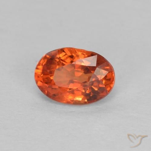 Saphir Orange rougeâtre naturelle ovale, 0.68 ct, VVS-VS