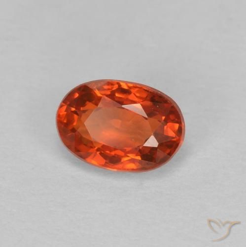 Saphir Orange rougeâtre naturelle ovale, 0.65 ct, VVS