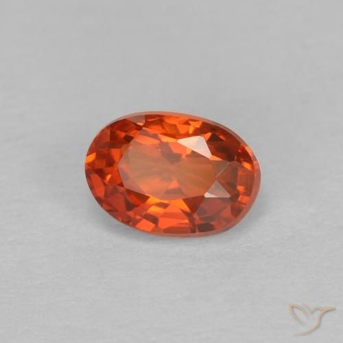 Saphir Orange rougeâtre naturelle ovale, 0.67 ct, VVS