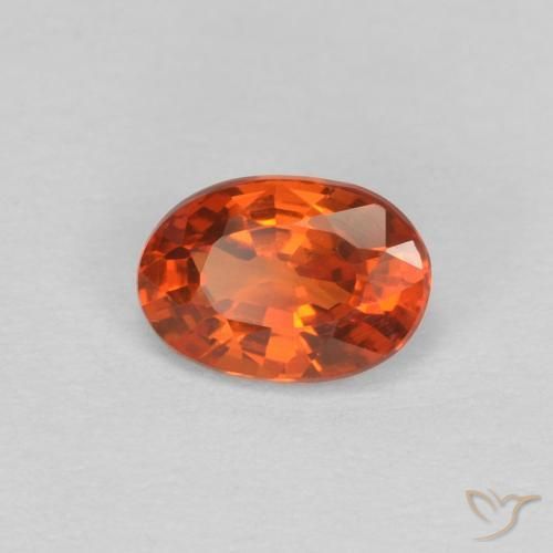 Saphir Orange rougeâtre naturelle ovale, 0.59 ct, VVS