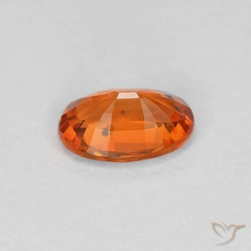 Saphir Orange rougeâtre naturelle ovale, 0.60 ct, VVS